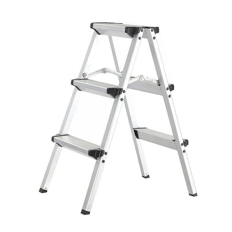Three-step metal ladder on a white background